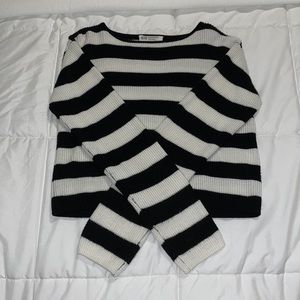 Black and white striped long sleeve top.
